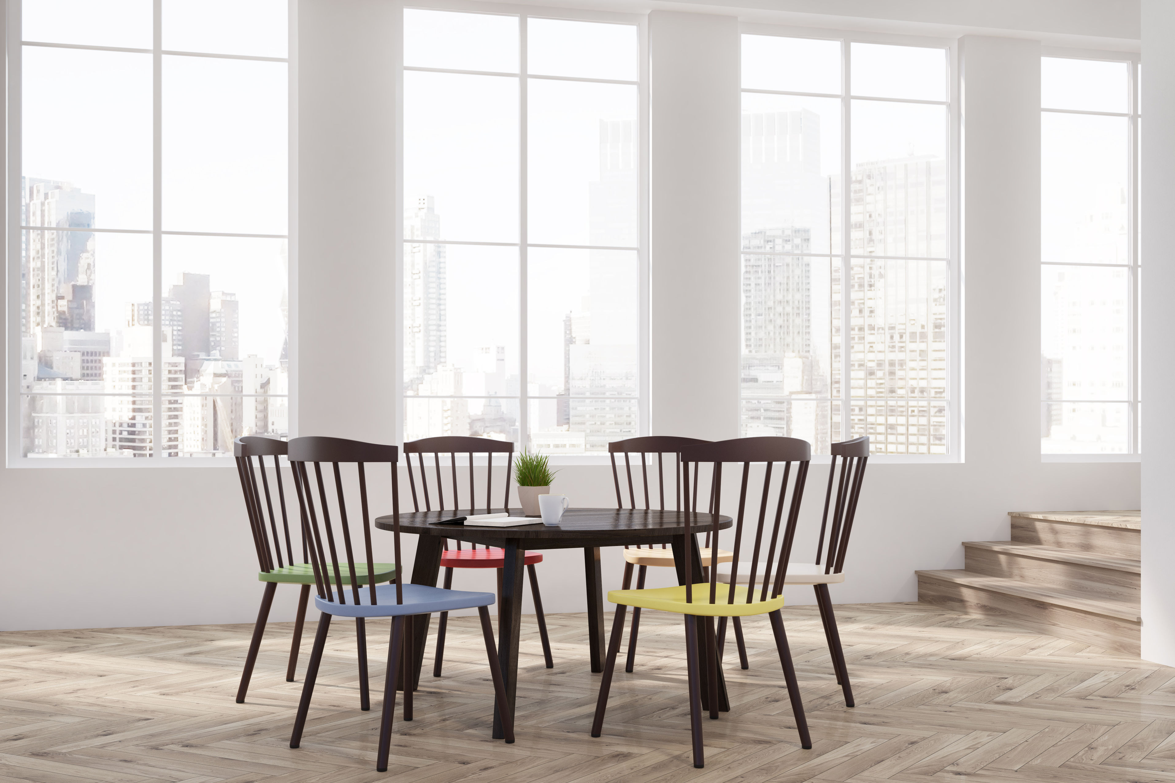 table avec chaises assises colorées